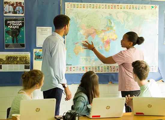 Teacher with Students in Geography Class - Solebury School